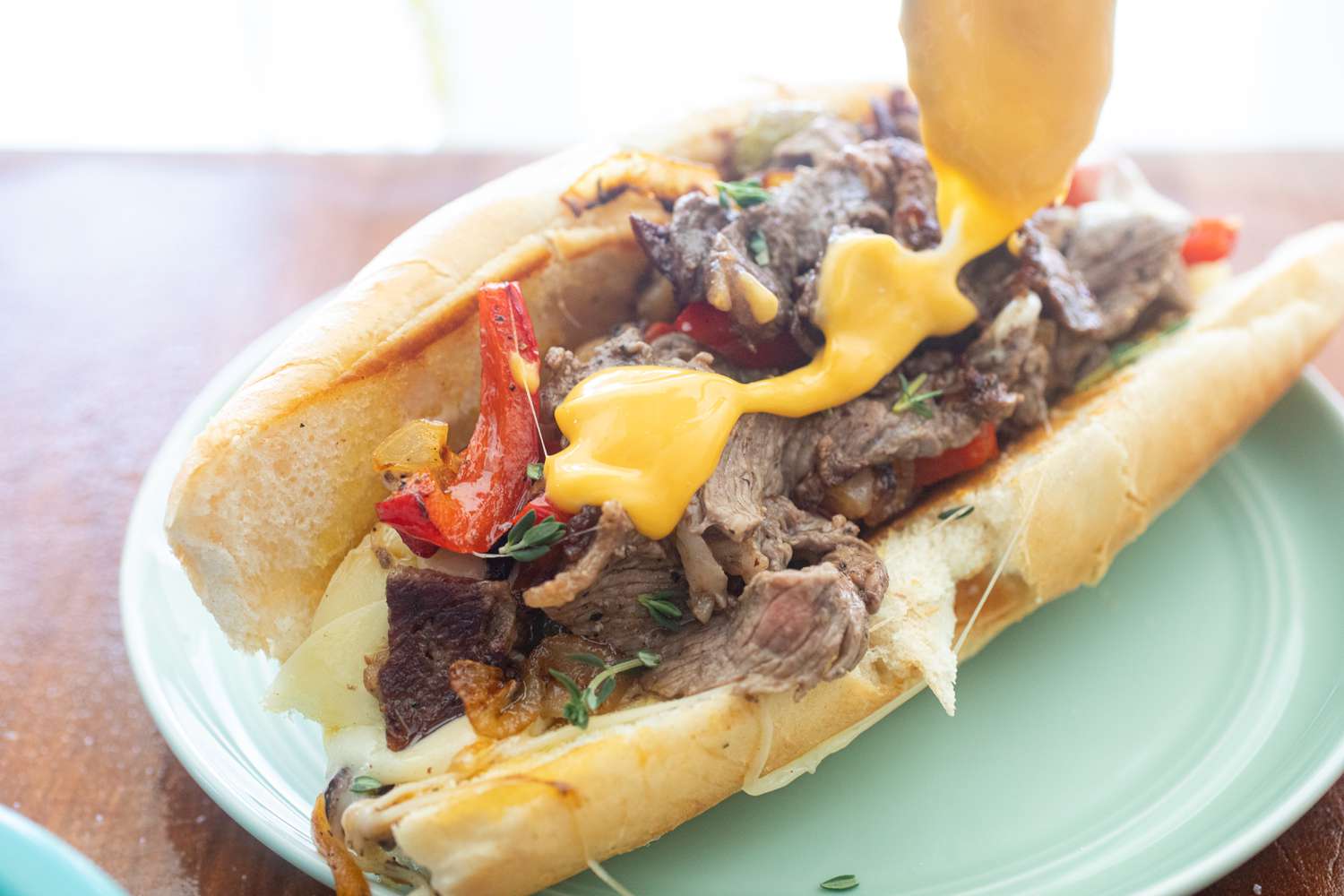 Adding Cheez Whiz to show how to make a Philly cheese steak.