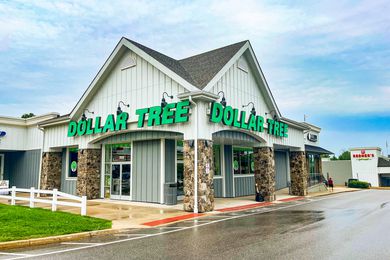 Exterior view of a Dollar Tree store in a plaza setting