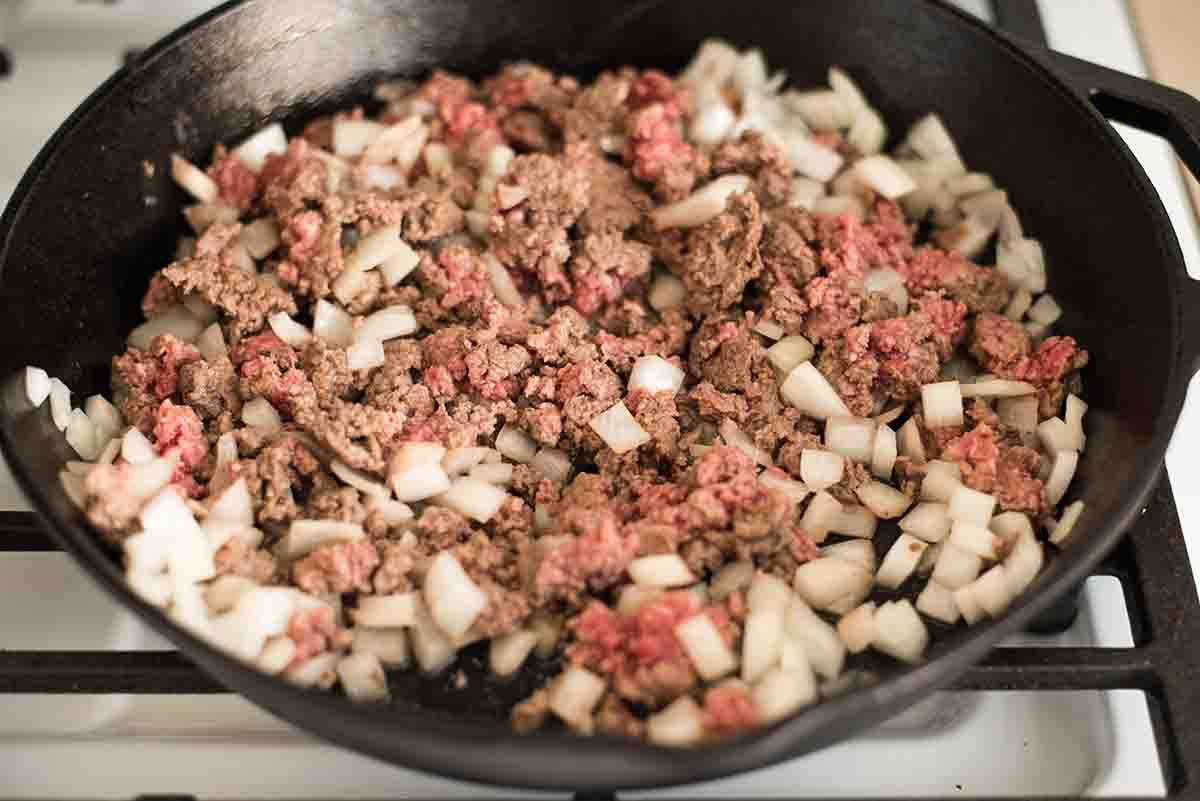 Brown the beef and the onions for making crockpot taco soup