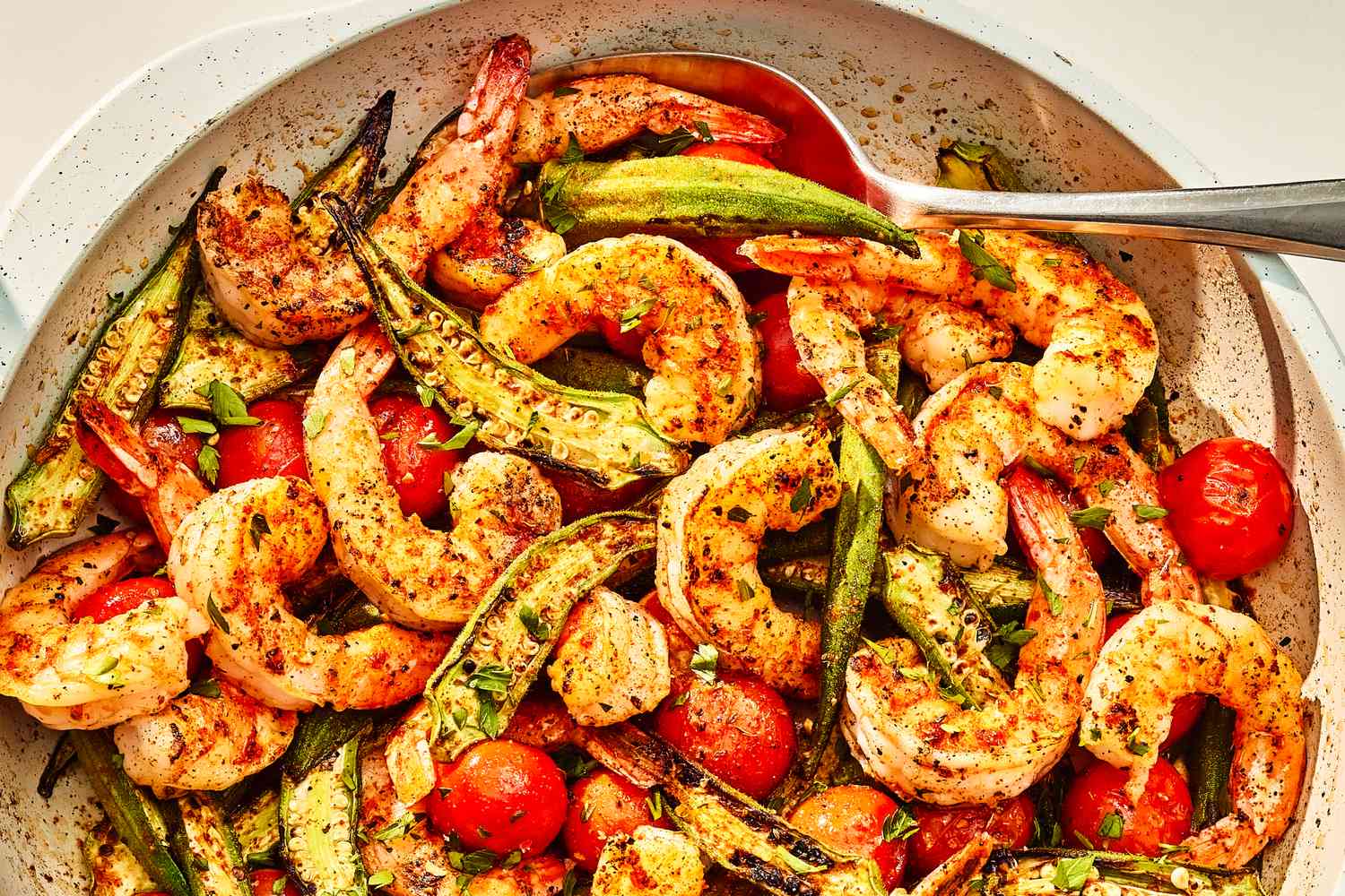 pan-roasted shrimp and okra in a pan