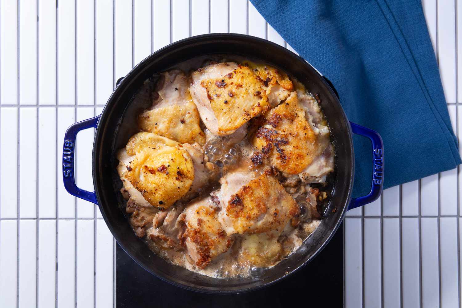 chicken fricassee boiling in the dutch oven
