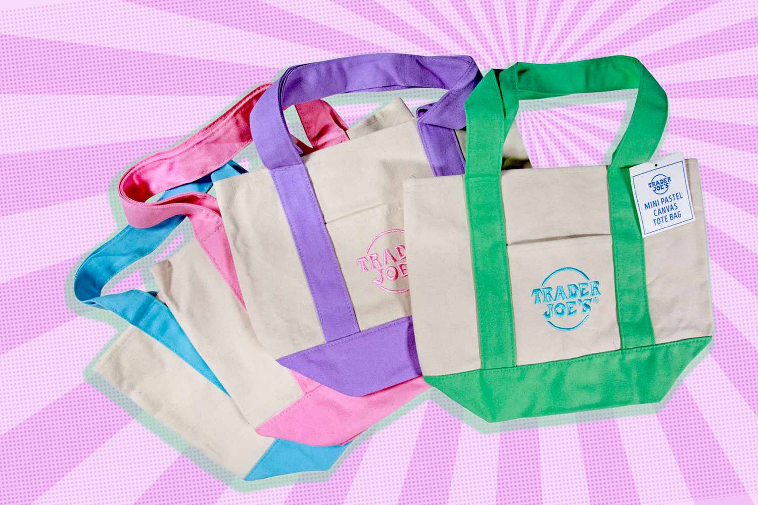 Trader Joe's tote bags displayed with various handle colors, promotional design.
