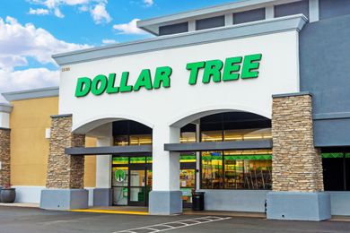 Image of a Dollar Tree store front with partly cloudy skies overhead