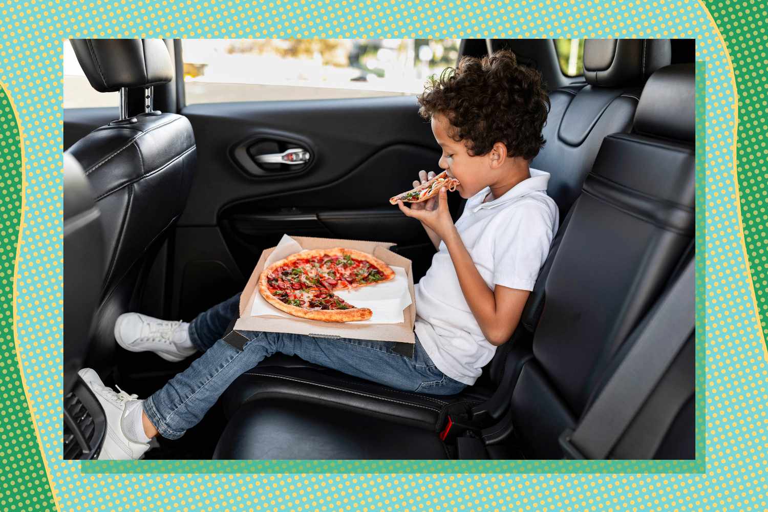 Kid eating a pizza in car