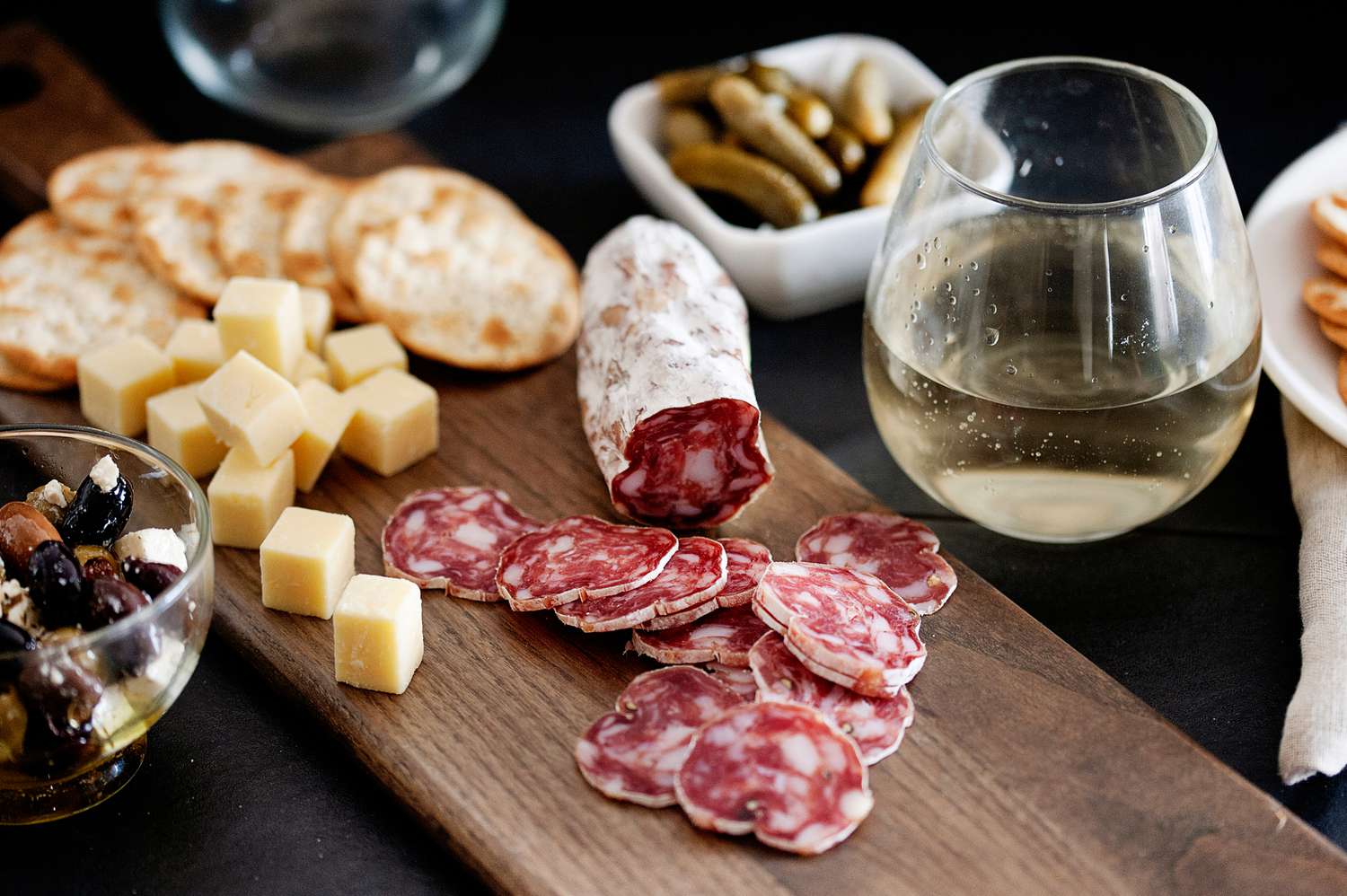 charcuterie spread with wine and soppressata