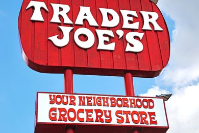 Trader Joe's store sign, text displaying branding and slogan