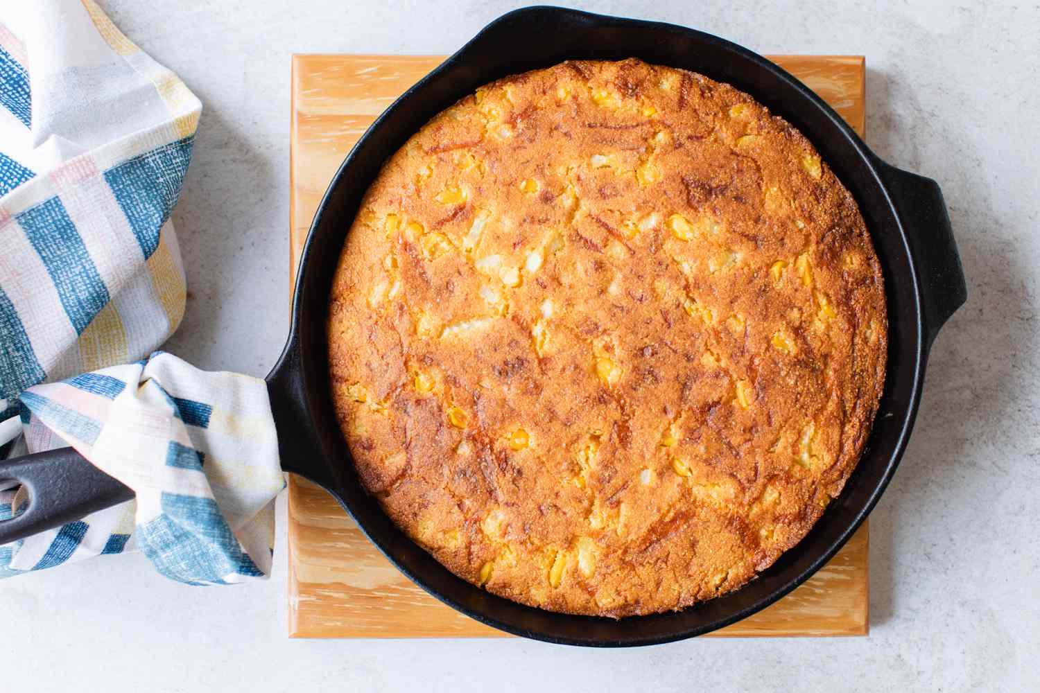 Cooked Cheesy Skillet Cornbread in Cast Iron Skillet