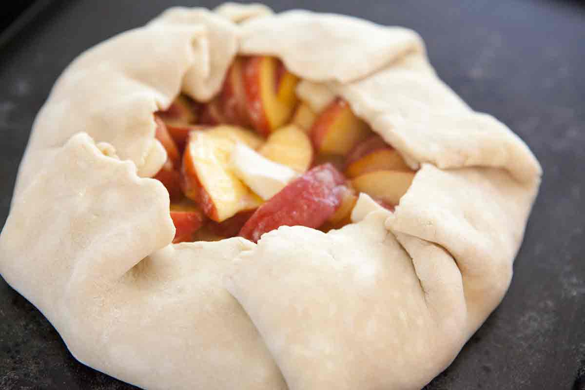 fold edges over peaches for galette