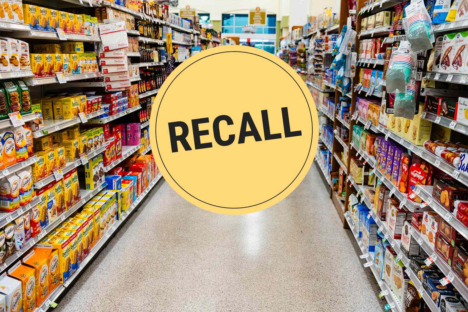 Supermarket aisle with a large recall notice in yellow