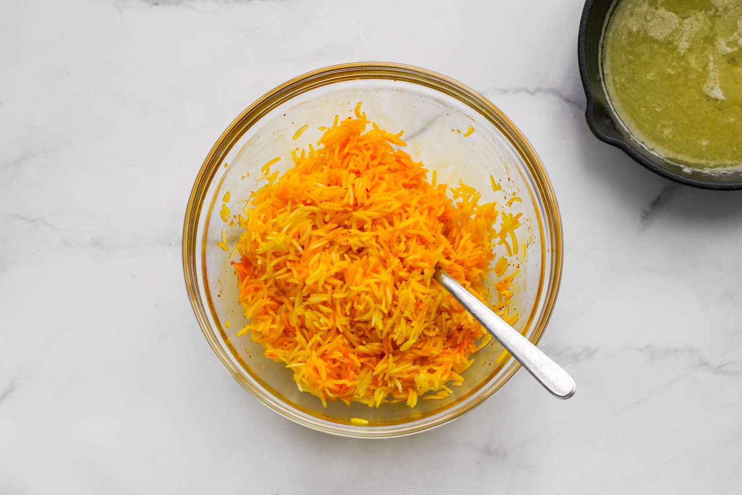 Half of the Rice Mixed With Bloomed Saffron for Tahdig Layer of Sabzi Polo (Persian Herb Rice)