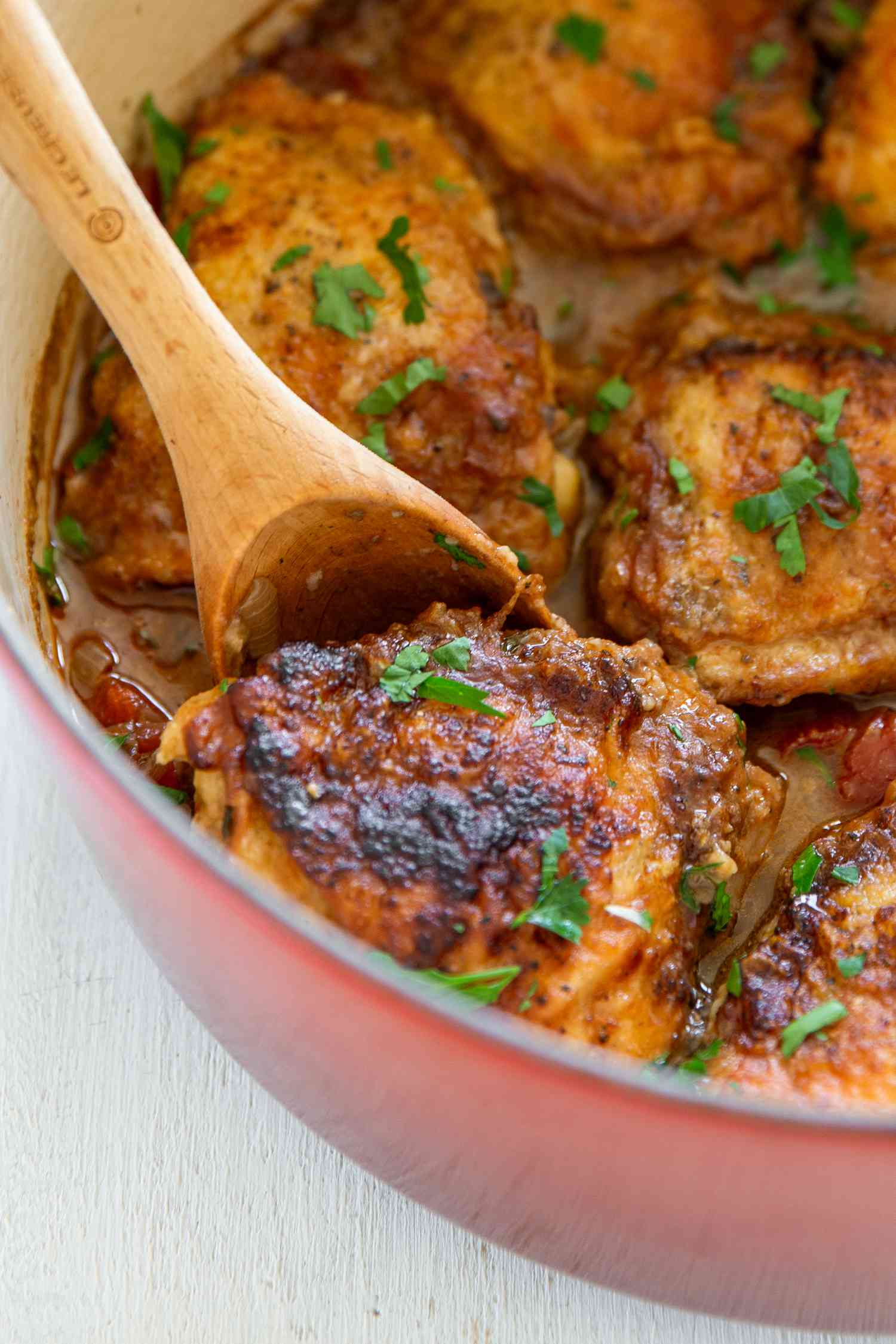 chicken marengo in a dutch oven (close-up)