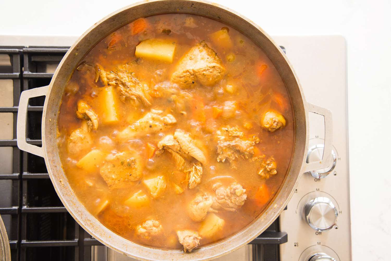 Pollo Guisado in a Caldero