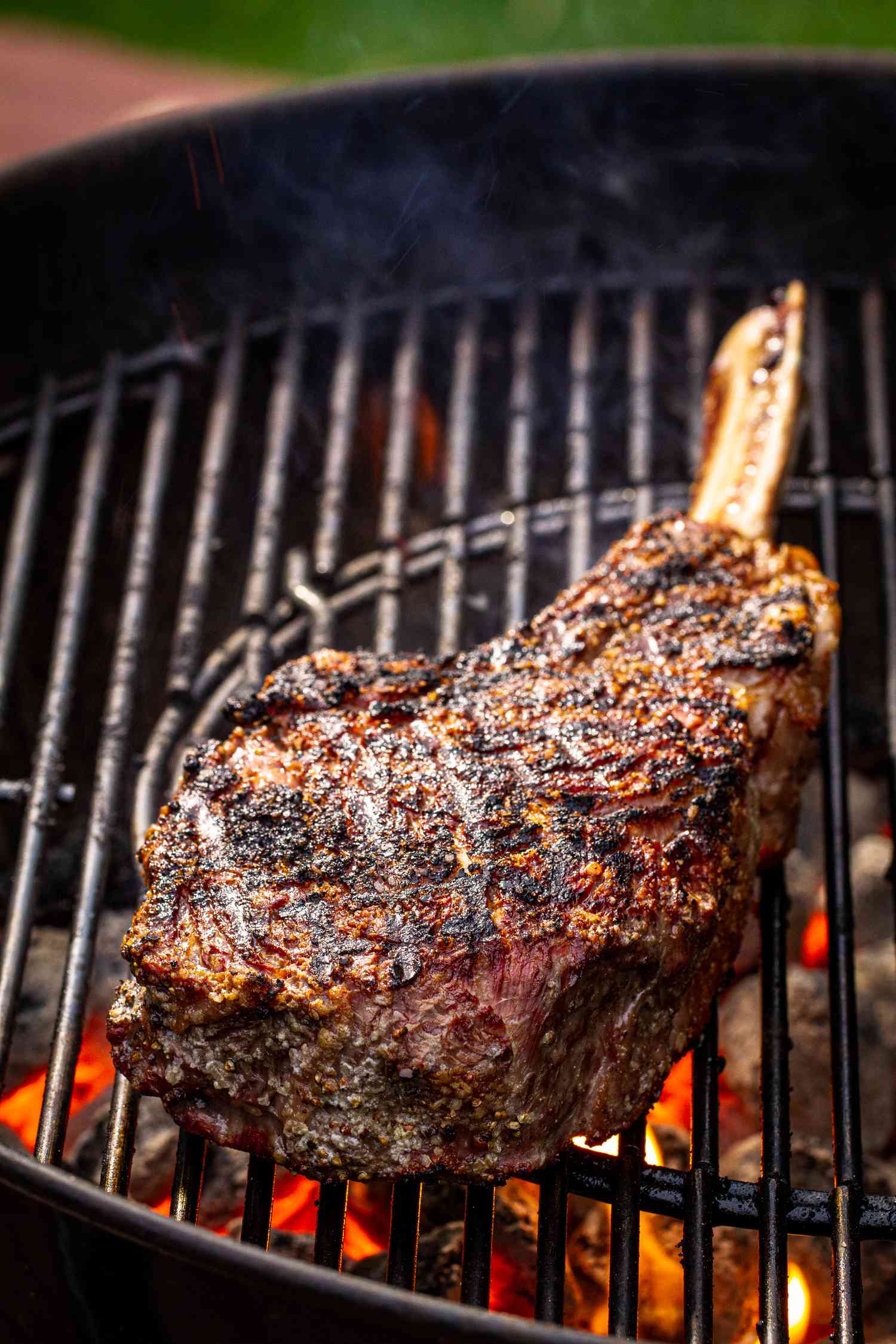 Grilled bone in steak on the grill