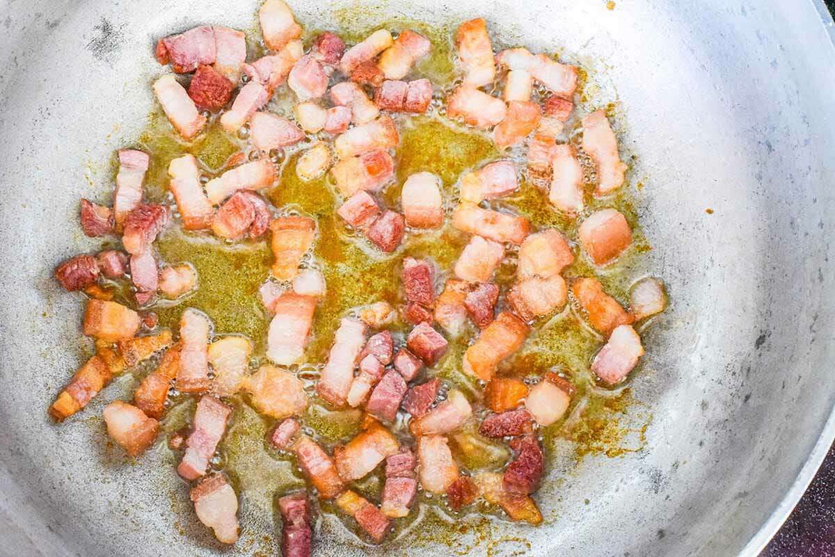 Puerto Rican Rice with Pork render the pork