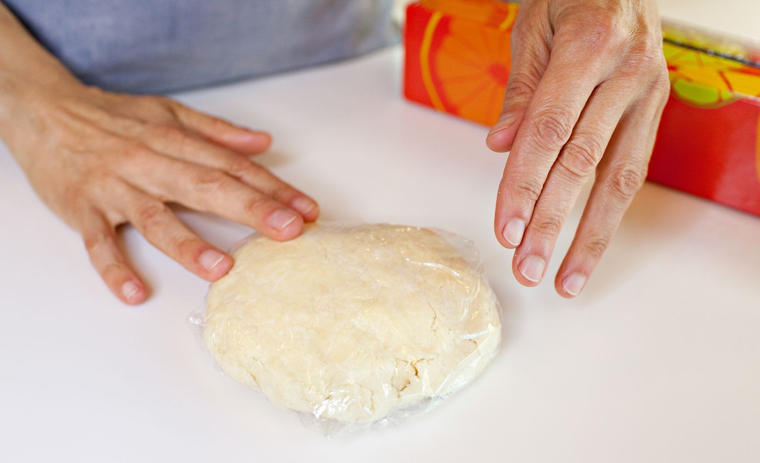 Pie Dough Disk Wrapped in Plastic Wrap