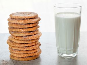 brown sugar snickerdoodles next to a glass of milk