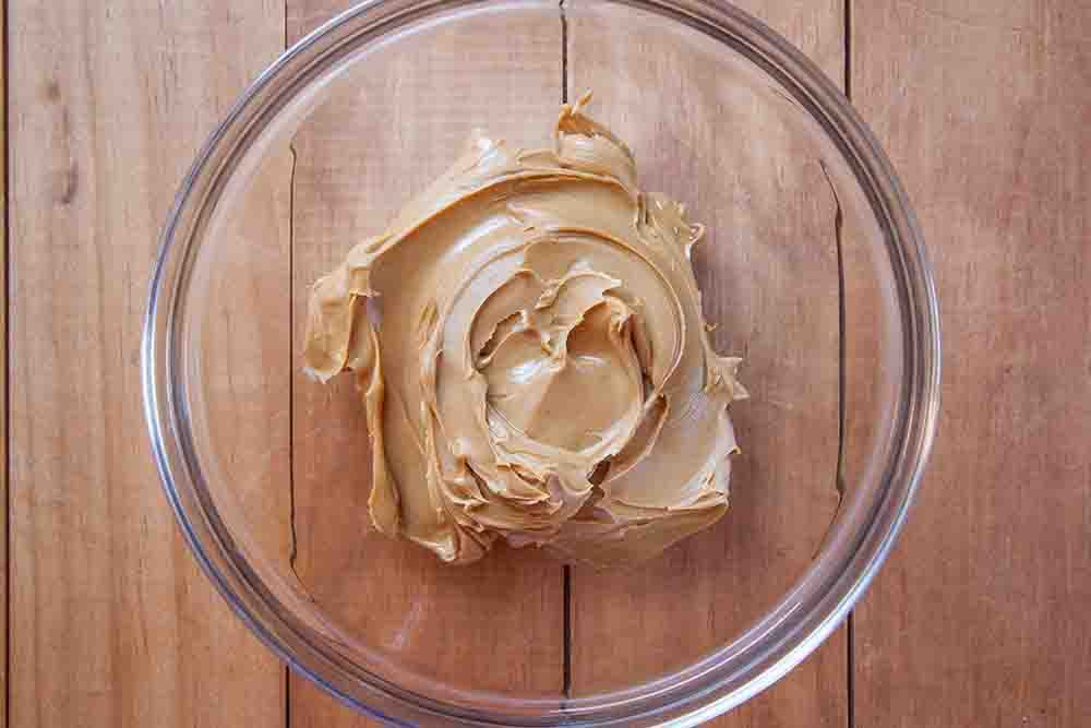 Filling in a bowl for Peanut Butter balls.