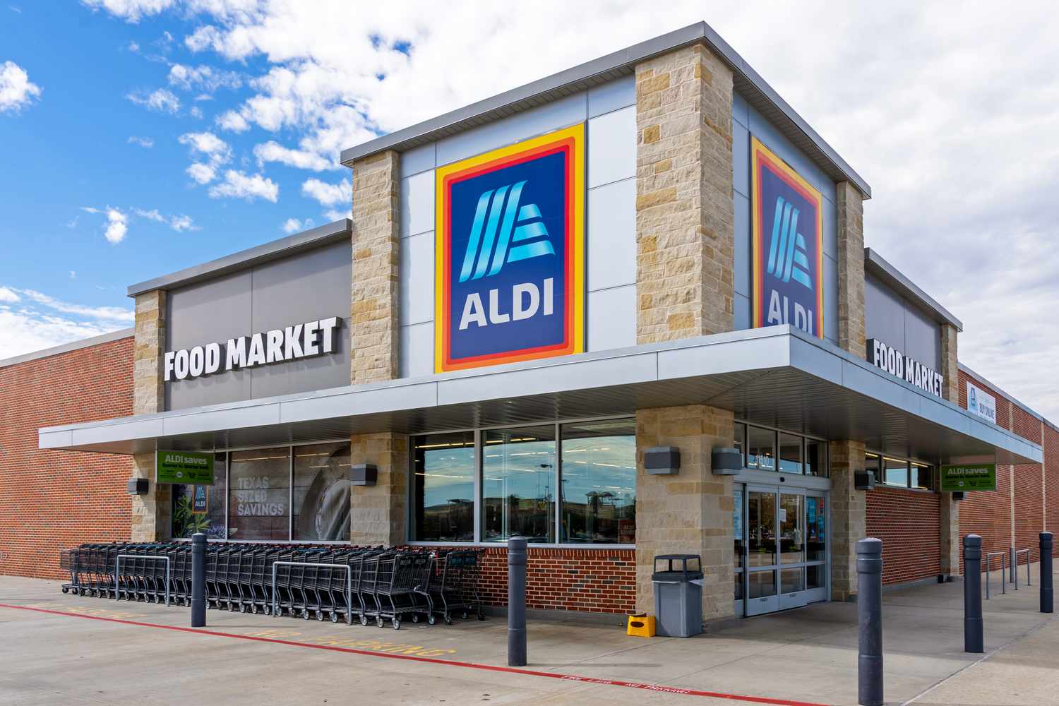 Aldi supermarket exterior with shopping carts near the entrance