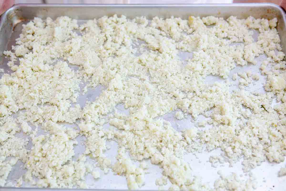 spread cooked cauliflower out in sheet pan for couscous
