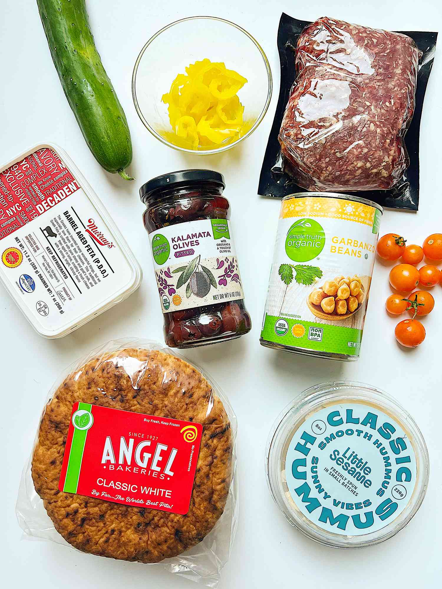 all ingredients of Ground Beef Hummus Bowls on a countertop