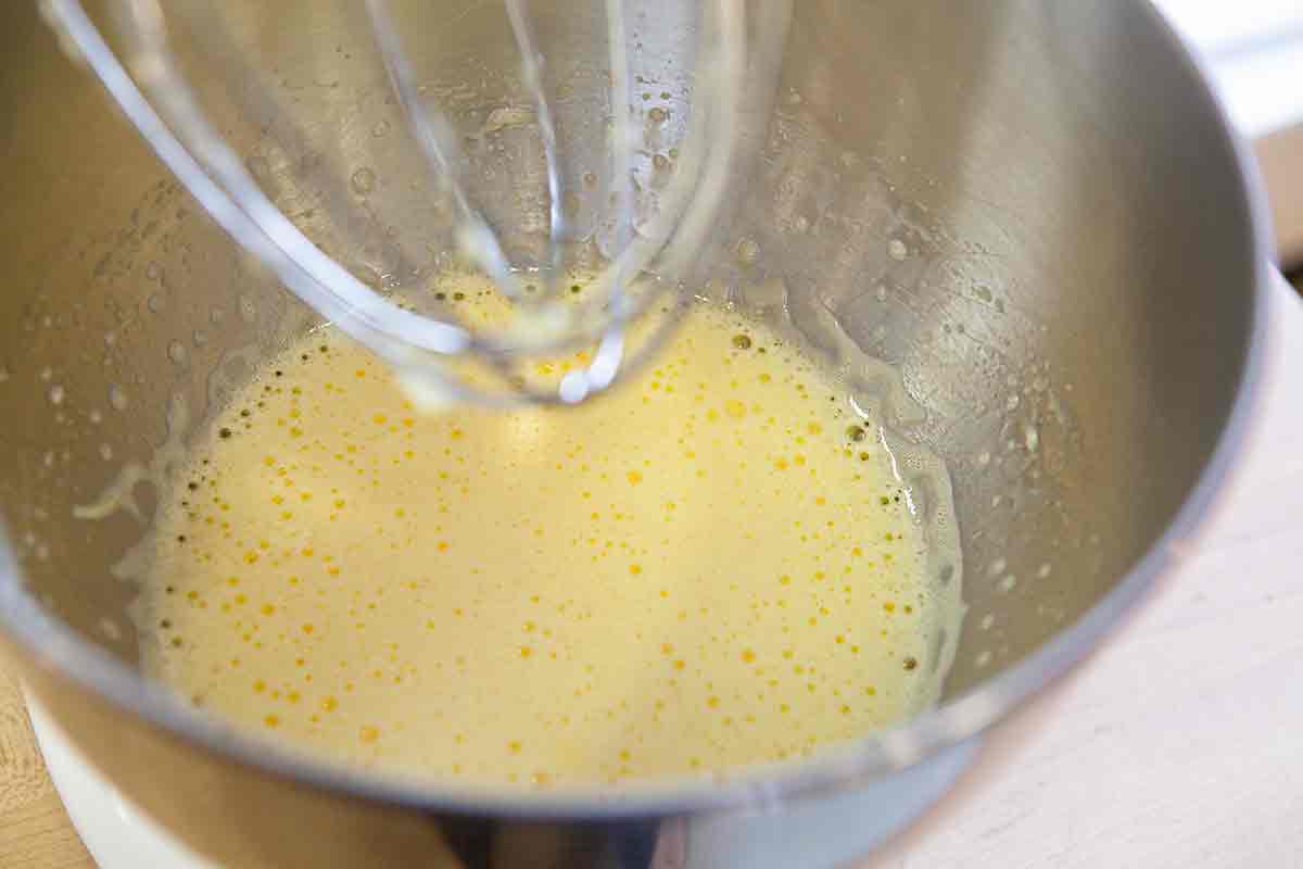 whip eggs to make batter for carrot souffle