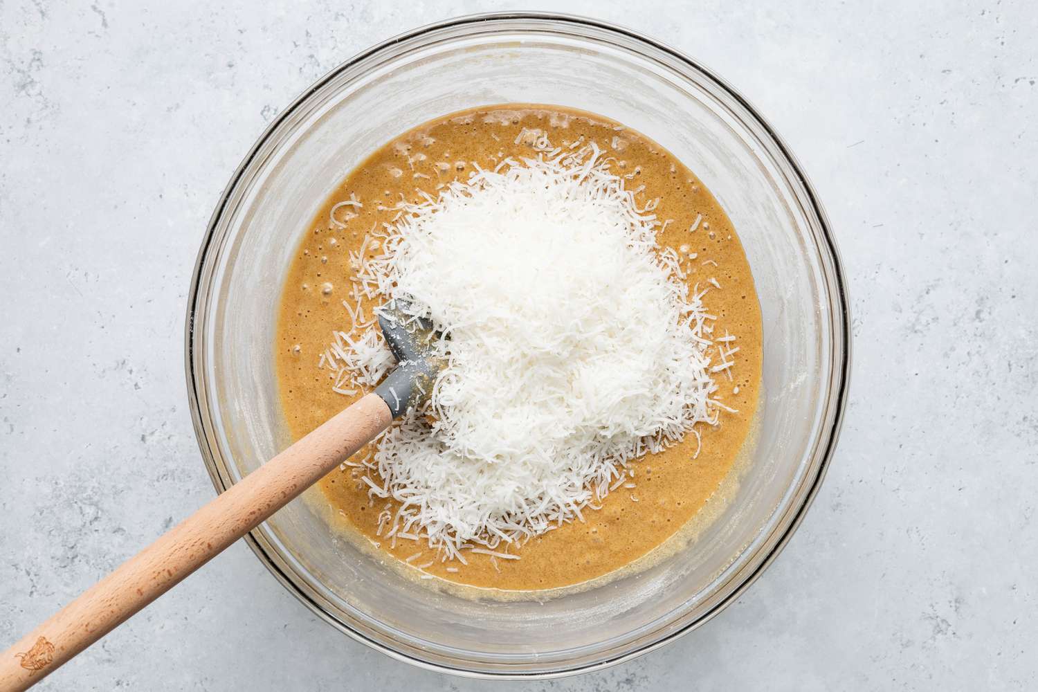 Shredded Coconut Added to Sad Cake Batter 