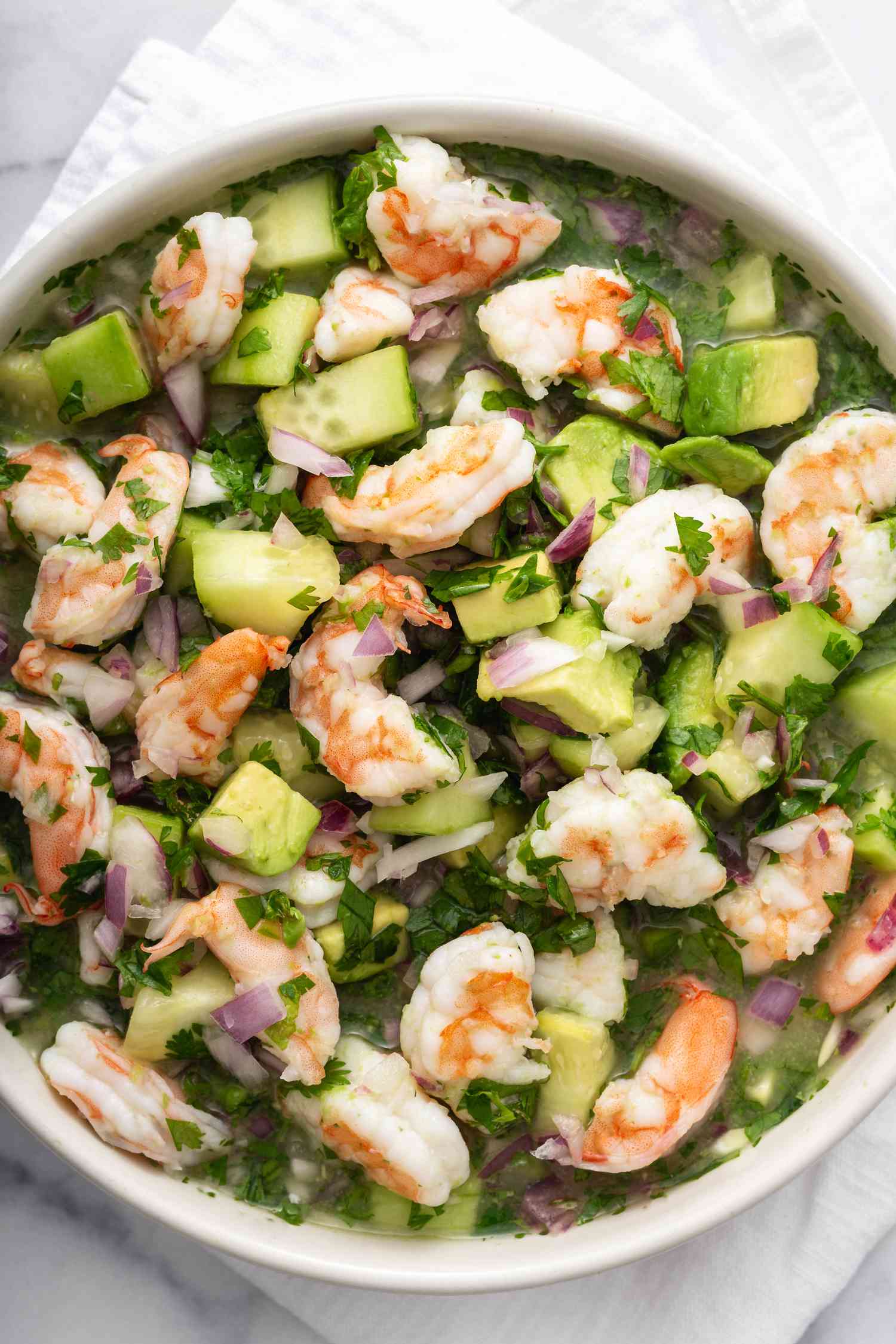 Overhead view of a bowl of a shrimp ceviche recipe.
