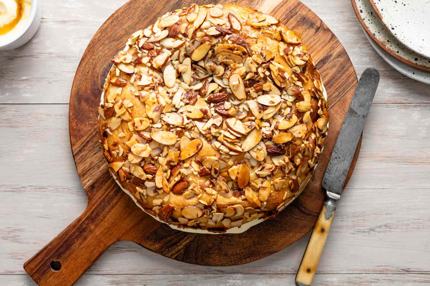 Bee Sting Cake on a Circular Wooden Board