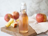 Spiced apple core simple syrup in swing top bottle