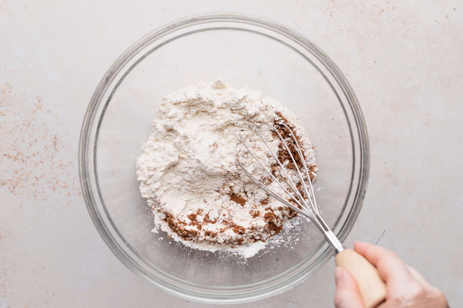 Mixing the dry ingredients for Pumpkin spice chocolate chip muffins.