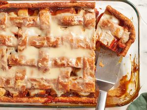 Sweet potato sonker in a baking dish with a piece being served