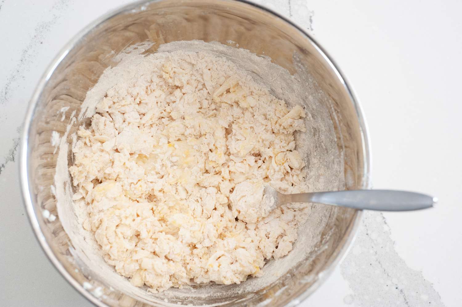 Dough mixed in a metal bowl to make Easy Irish Scones.