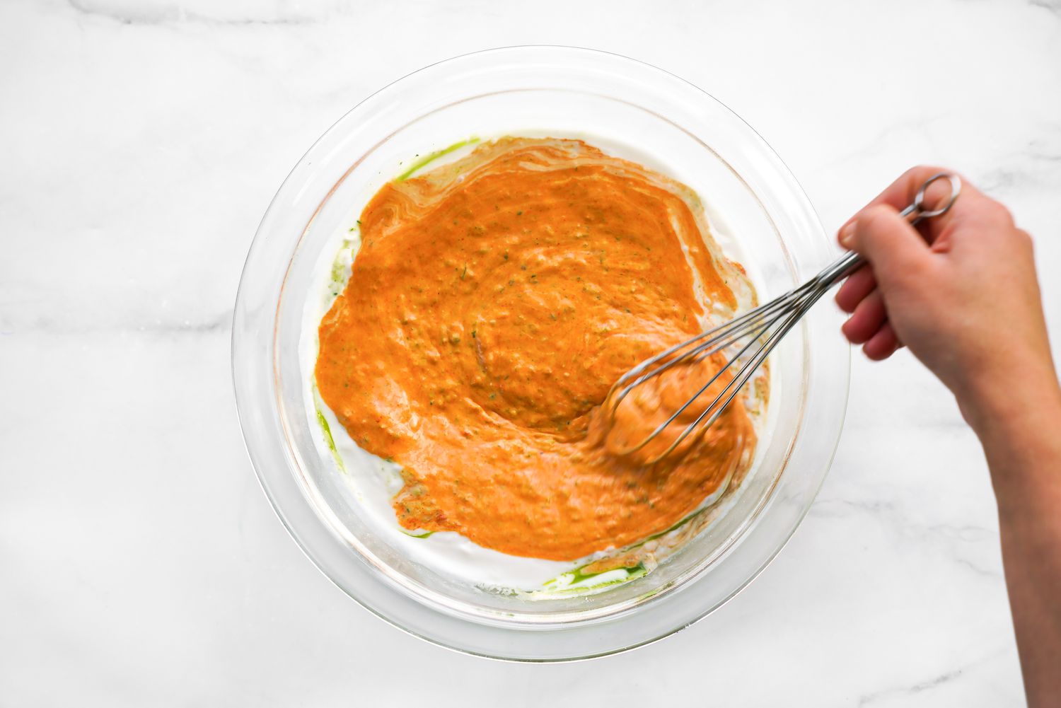 Red Curry Ingredients Whisked Together in a Bowl for Microwave Red Curry Salmon