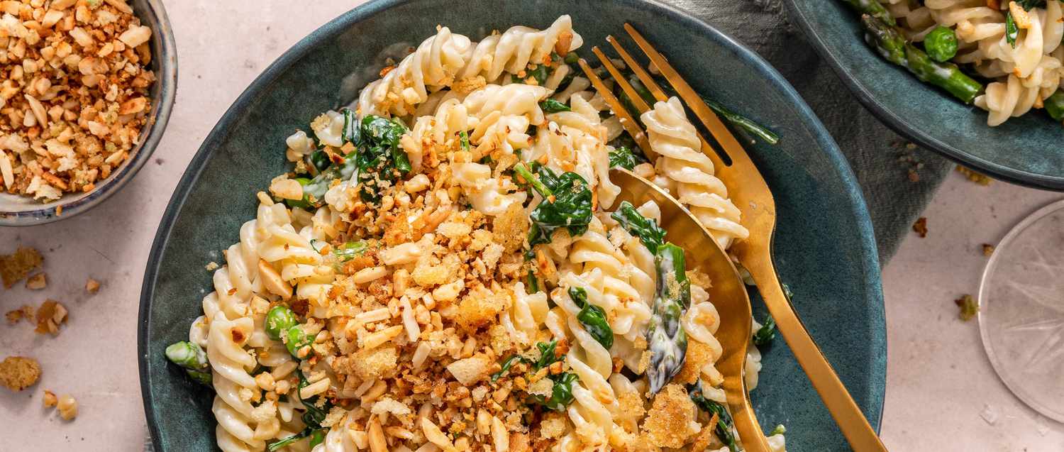 Bowl of fusilli with spring vegetables