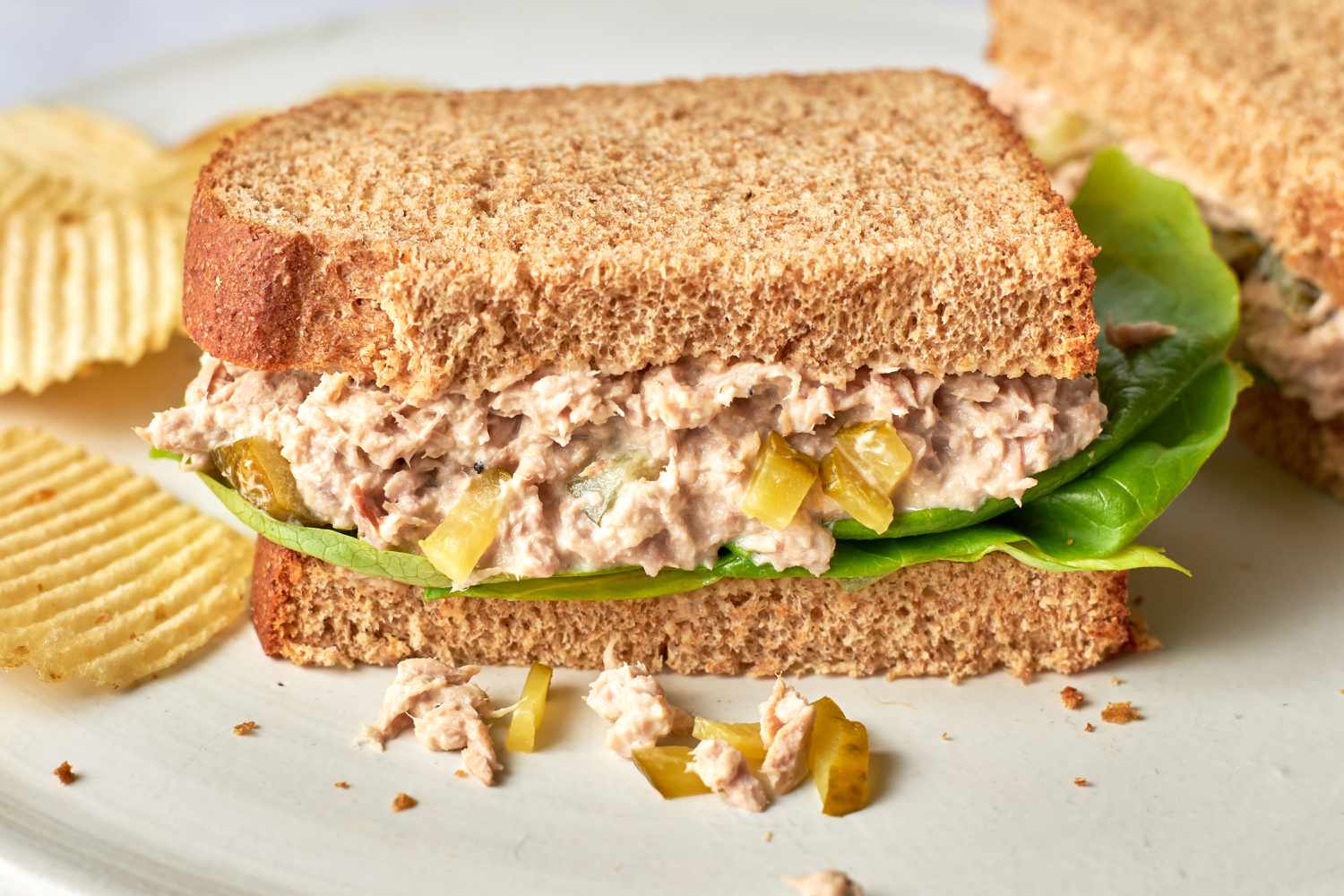 Dill Pickle Tuna Salad sandwich halved on a plate