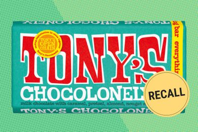 Tony's Chocolonely Everything Bar on a green speckled background with a round RECALL sticker on the lower right of the image