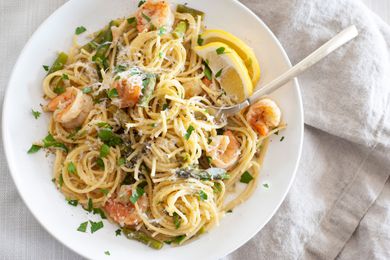 Shrimp and Asparagus Pasta on a Plate with a Fork