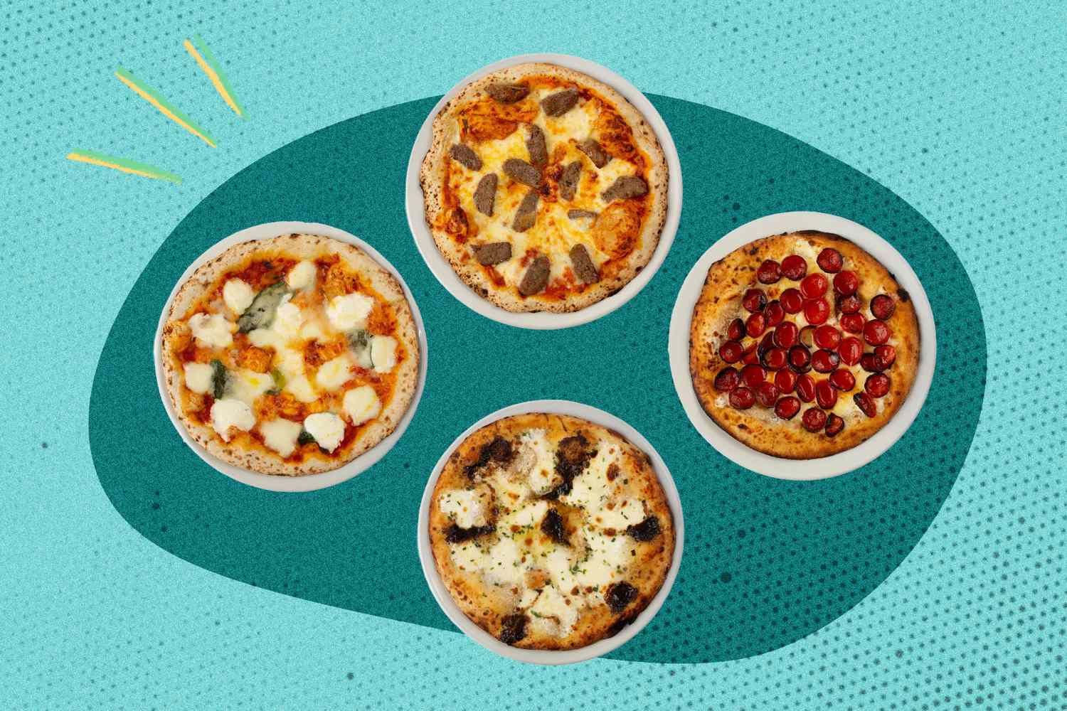 An arrangement of four pizzas on a textured blue background each with distinct toppings displayed