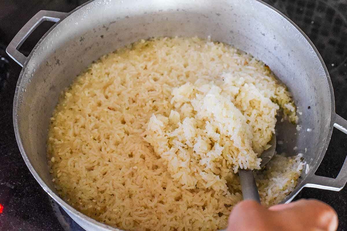 Puerto Rican Rice with Bacon fluff the steamed rice