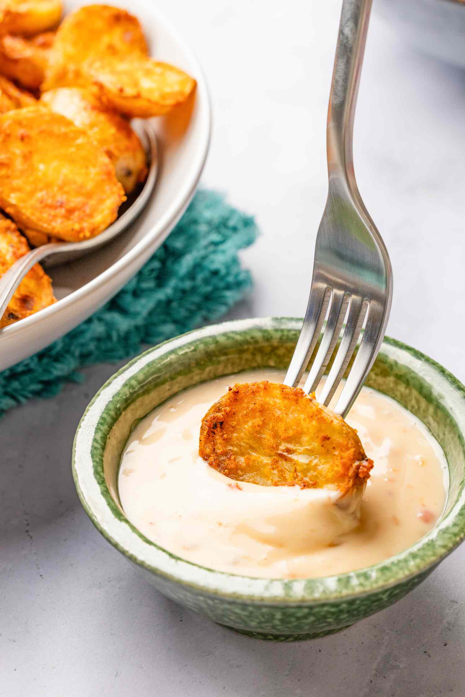 potato dipped in bang bang sauce (bang bang potatoes)