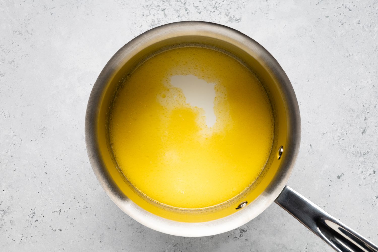 Melted Butter and Milk in a Pot for Povitica Recipe