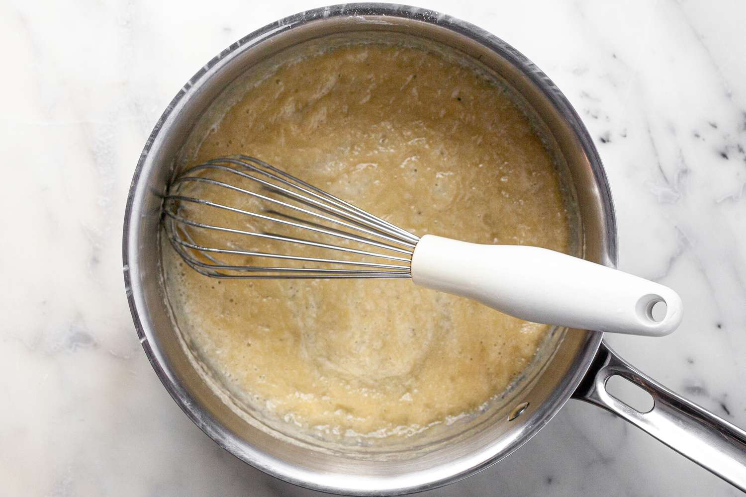 Flour and Melted Mixed Together in a Pot to Make a Roux for Chicken Lasagna Recipe