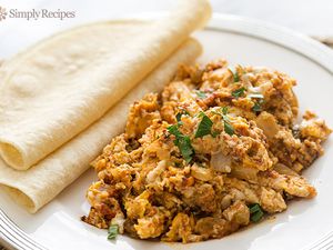 Chorizo and Eggs on a plate with tortillas