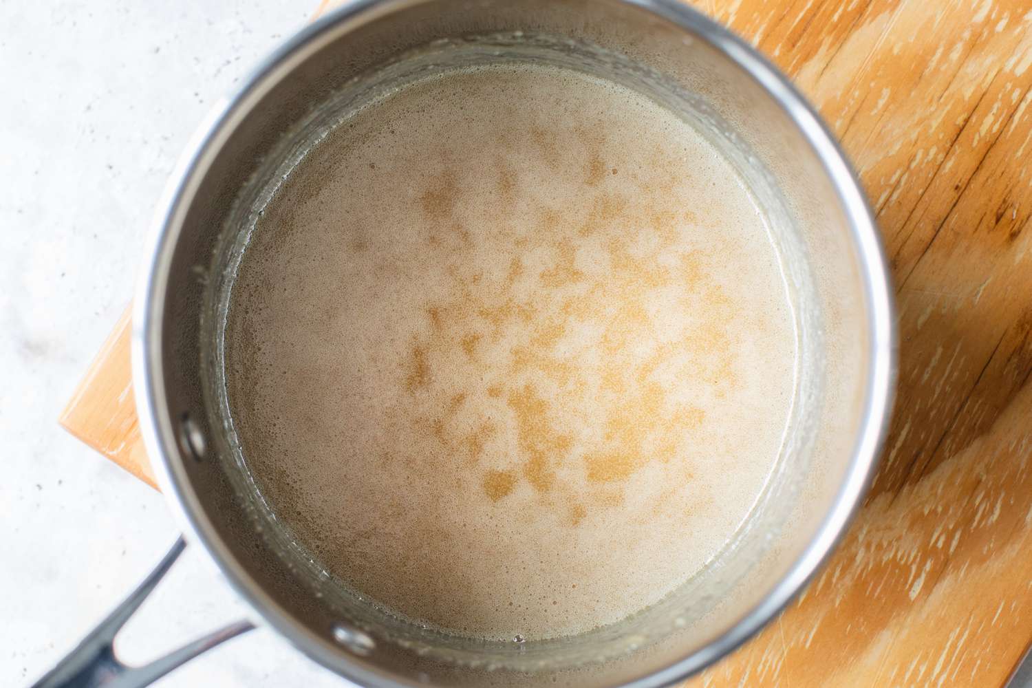 Pot of Glaze for Best Fresh Apple Bundt Cake