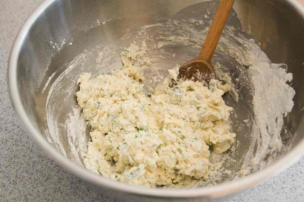 Dumpling recipe mixed in a metal bowl.