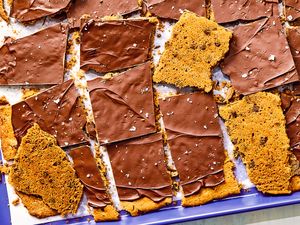Chocolate chip cookie bark on a baking tray