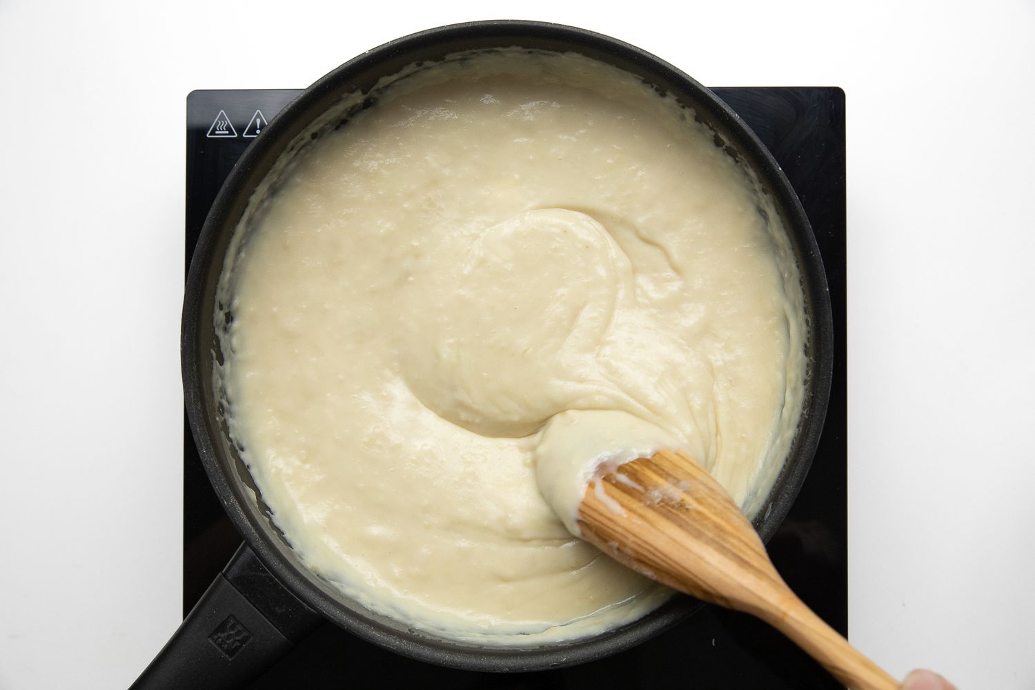 Thickened Topping Mixed Using a Wooden Spoon