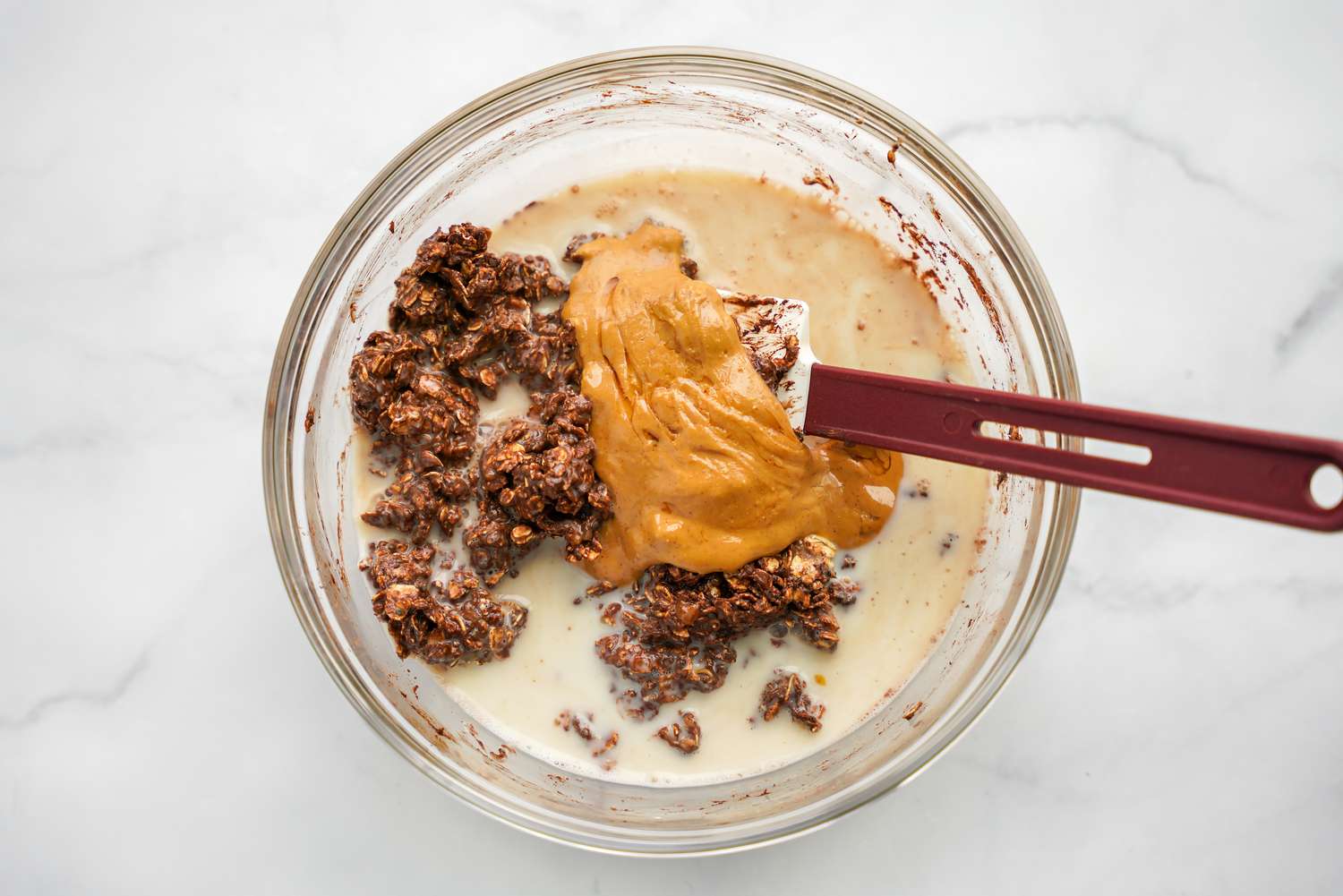 Wet Ingredients (Peanut Butter, Almond Milk, etc) Added to Bowl for Vegan Oatmeal Brownie Recipe