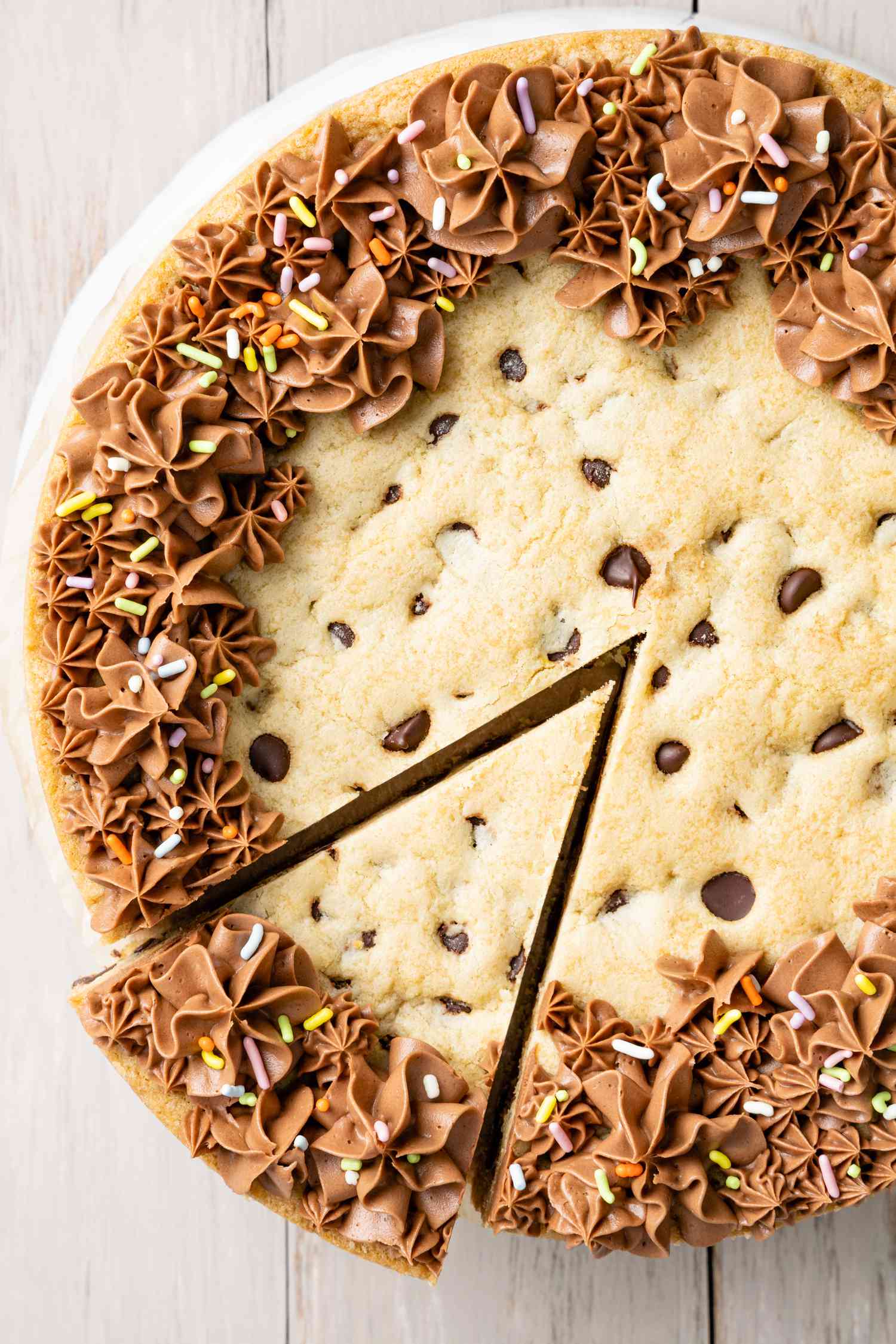 Chocolate Chip Cookie Cake with a Slice Cut