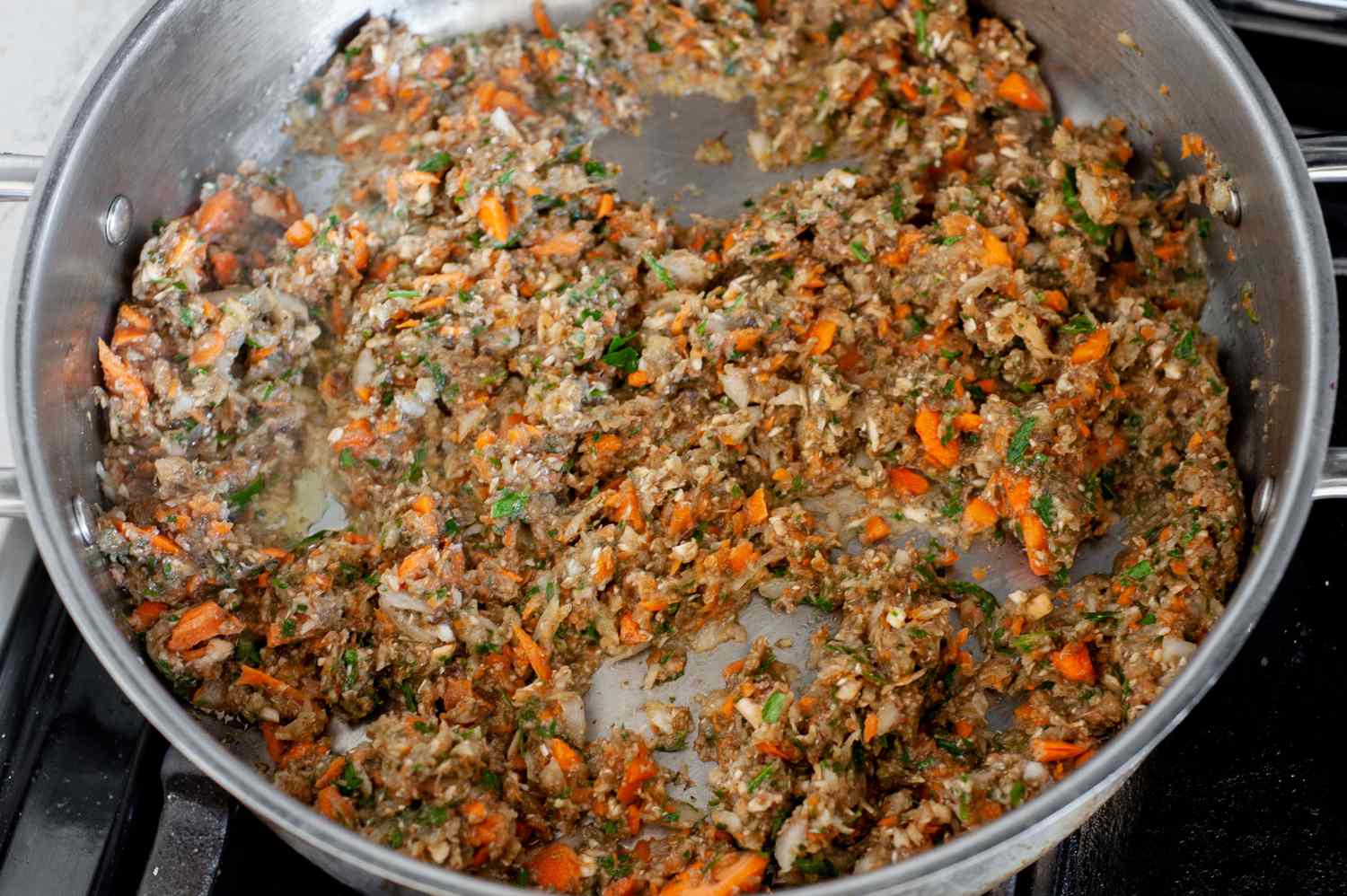 Chopped Vegetables Cooked over a Stove in a Pan